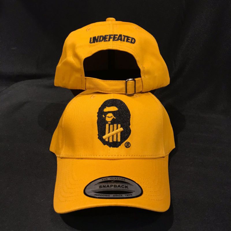 Bape x undefeated hat sale
