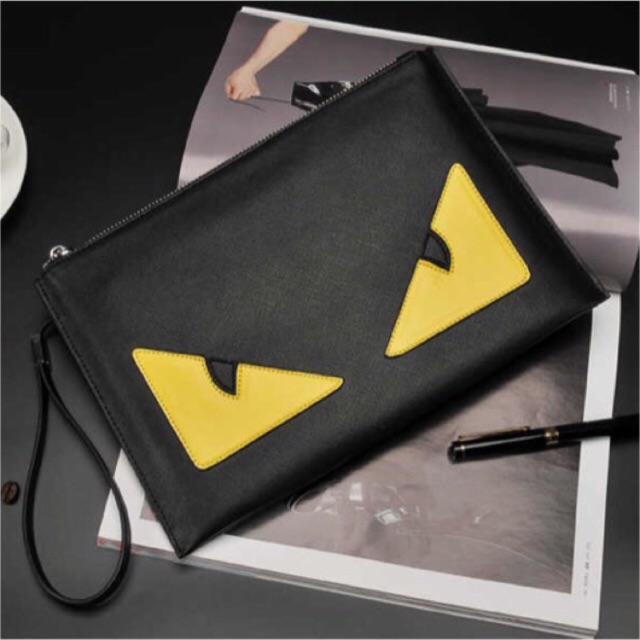 Fendi monster clutch online