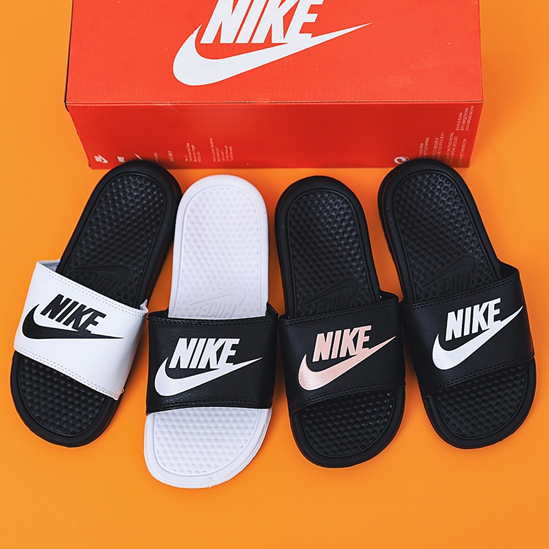 Nike slippers 2024 at lowest price