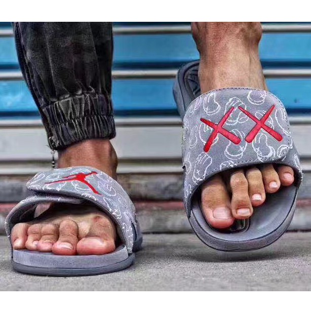 Air Jordan KAWS x Air Jordan Hydro 4 Cartoon Style Suede Slippers Shopee Malaysia