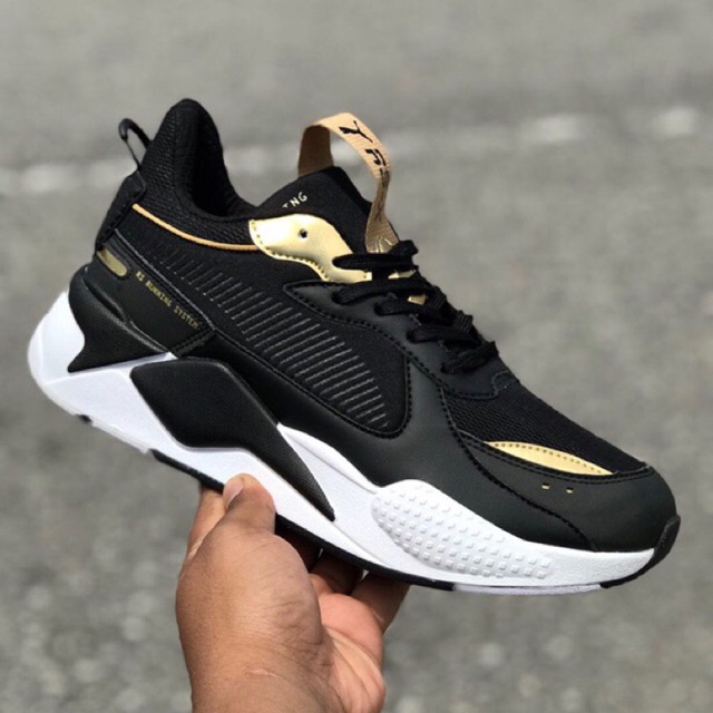 Puma rsx cheap trophy black gold