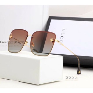 Gucci sunglasses store with bee