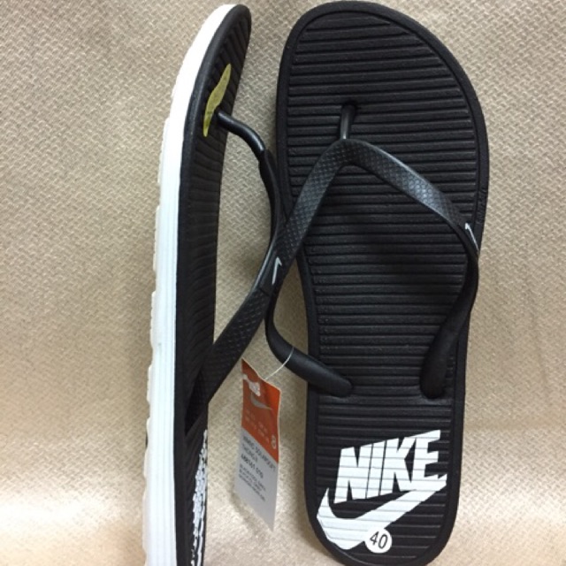 Nike squeeze store flip flops