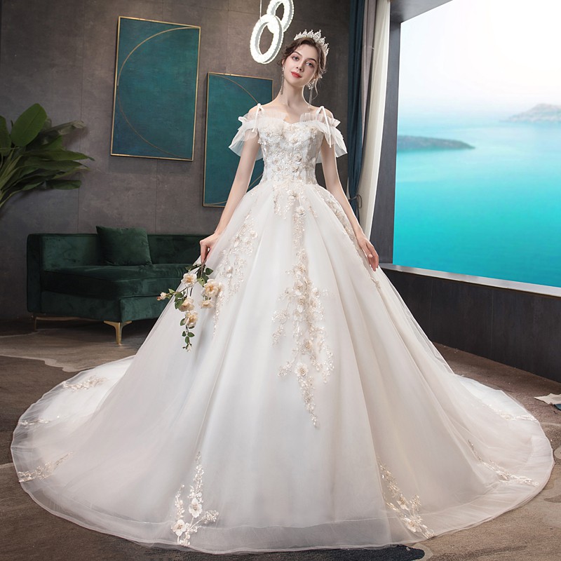 Tail cut wedding outlet dress price