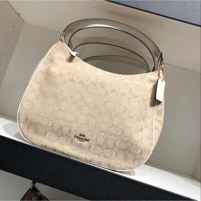 Coach zip shoulder deals bag in signature jacquard