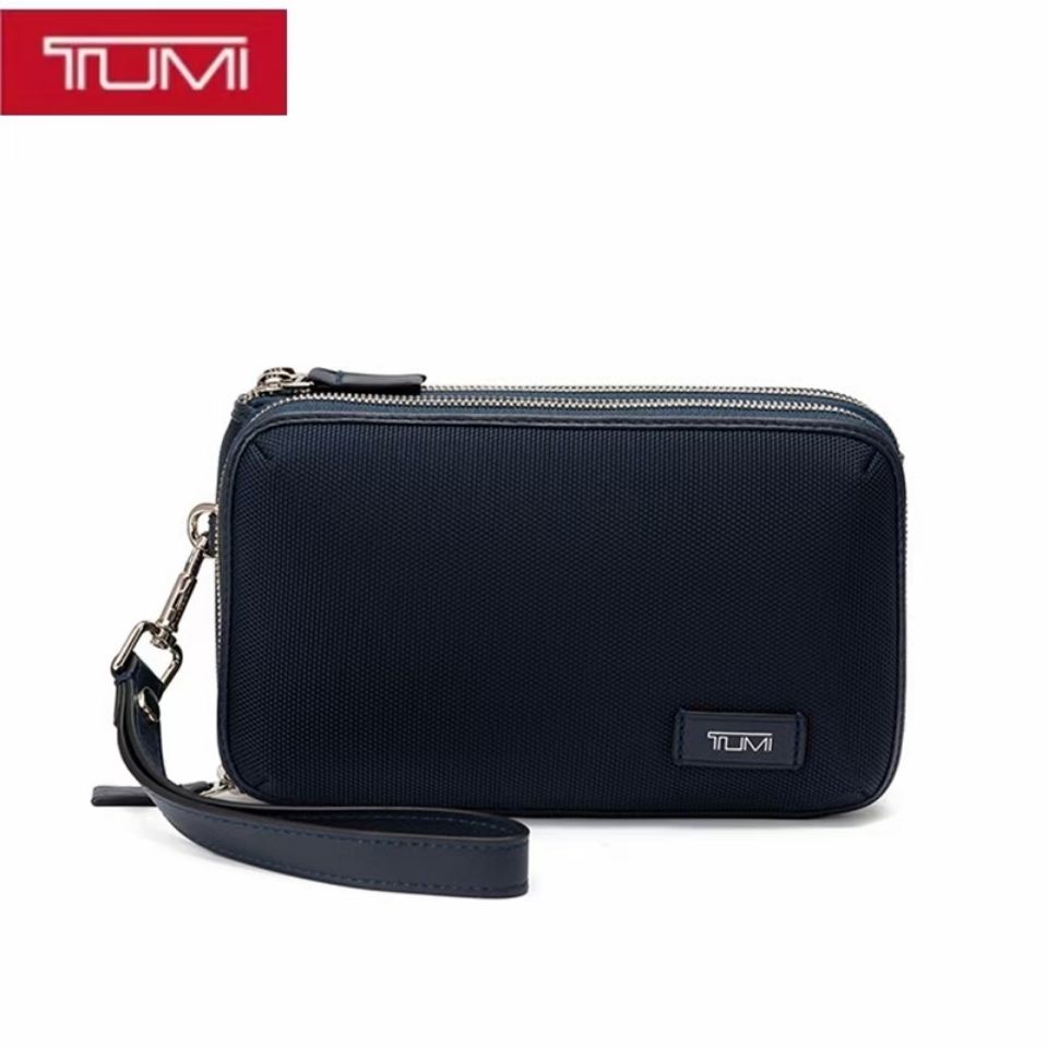 Tumi men's clutch online bag