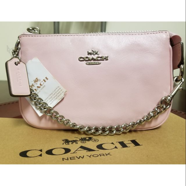 COACH Nolita Wristlet 15 In Pebble Leather in Pink