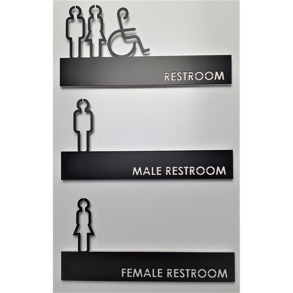 Laser cut through 3d solid black metal male & female toilet wayfinding ...