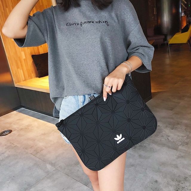 Adidas issey miyake hotsell clutch bag