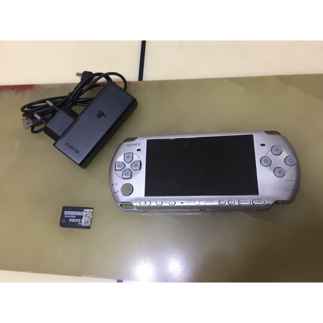 Sony PSP Slim & Lite Handheld Game Console - Ice Silver