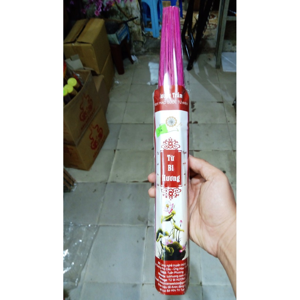 Incense lit with the brand of Compassion (Incense sticks rolled up ...