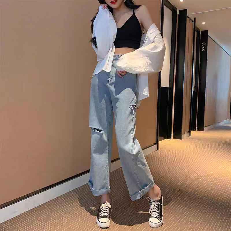 high-waisted-long-jeans-flared-legs-decorated-with-torn-beautiful-shape
