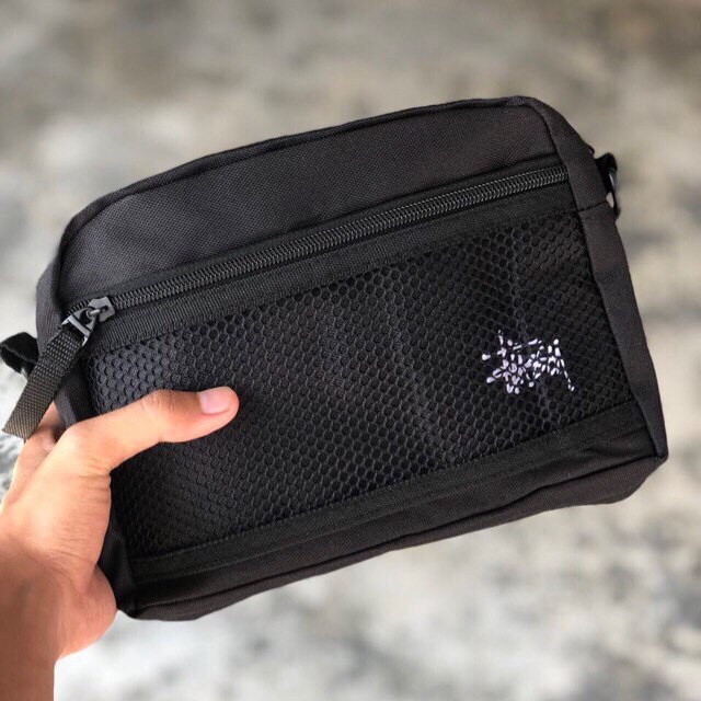 Stussy clutch discount bag