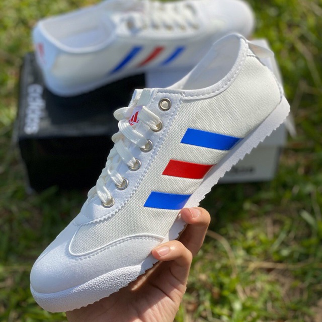 White shoes with on sale blue and red stripes