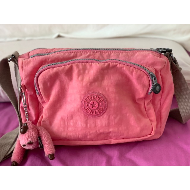 Original kipling sling outlet bag price