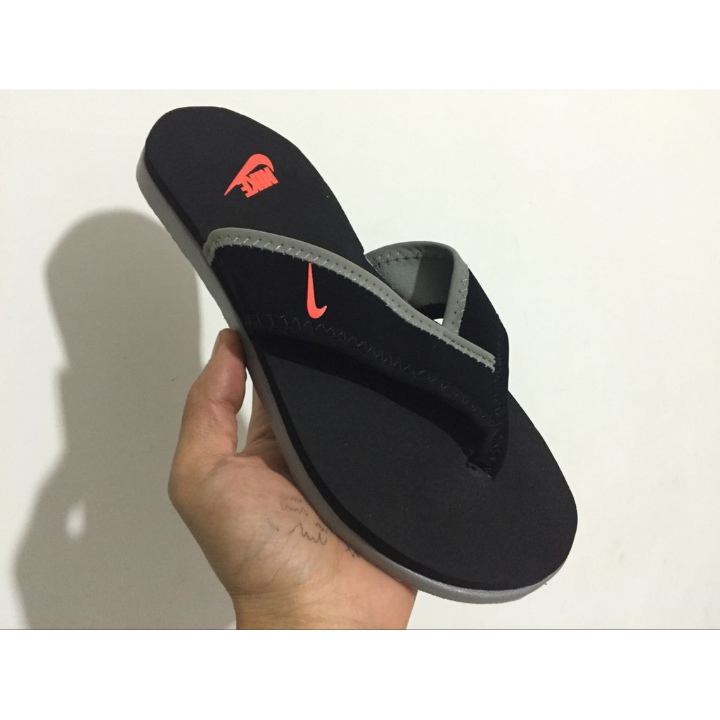 Nike squeeze store me slippers