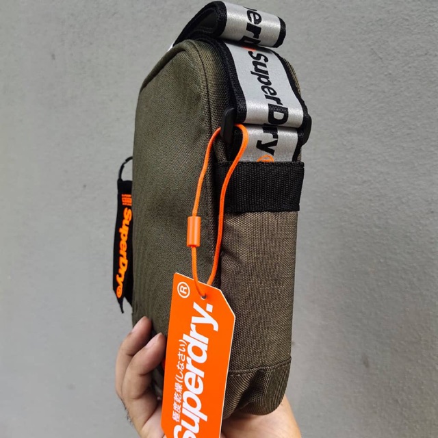 Super dry 2025 sling bag