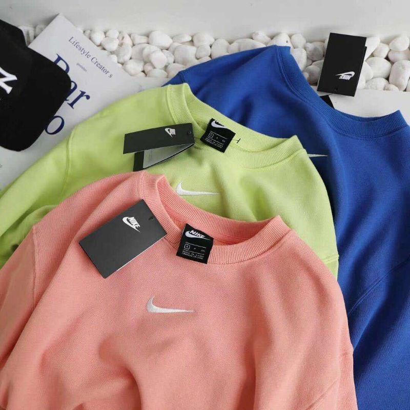 Nike hoodie with tick in the middle sale