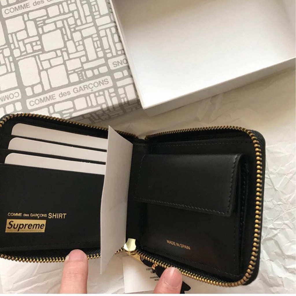 Comme des garcons wallet supreme best sale