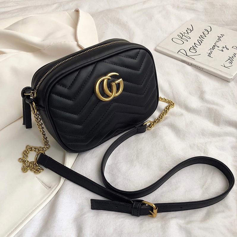 Cg best sale purse logo