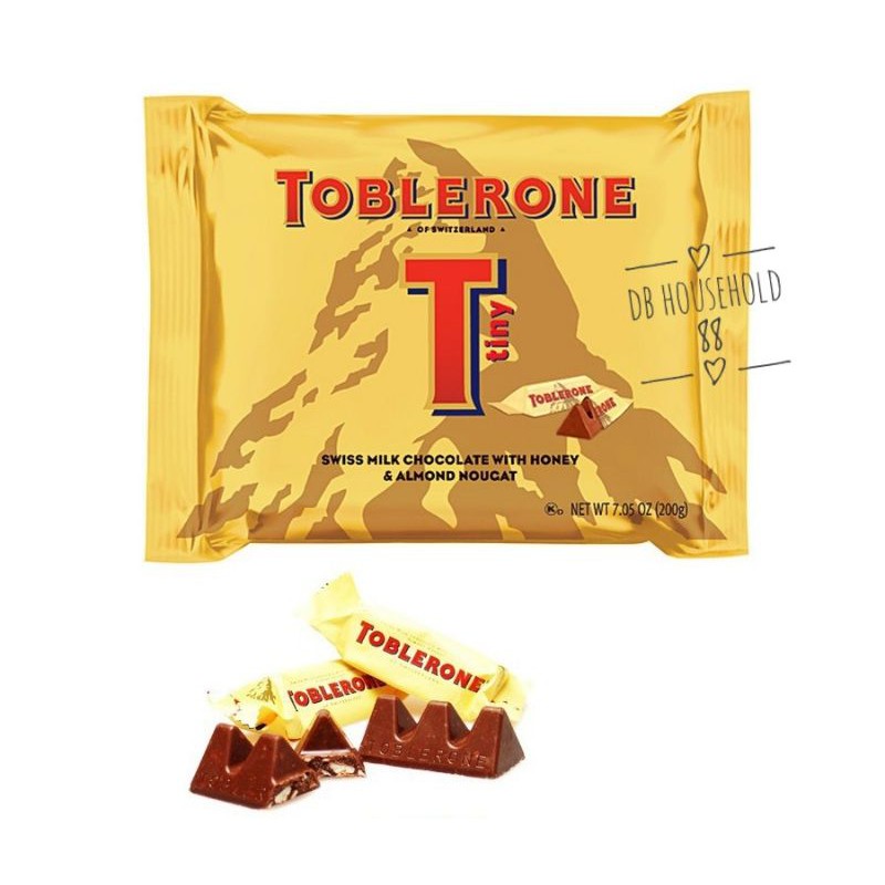 Toblerone Tiny Swiss Milk Chocolate With Honey & Almond Nougat 100 pcs  Boxed Reviews 2024