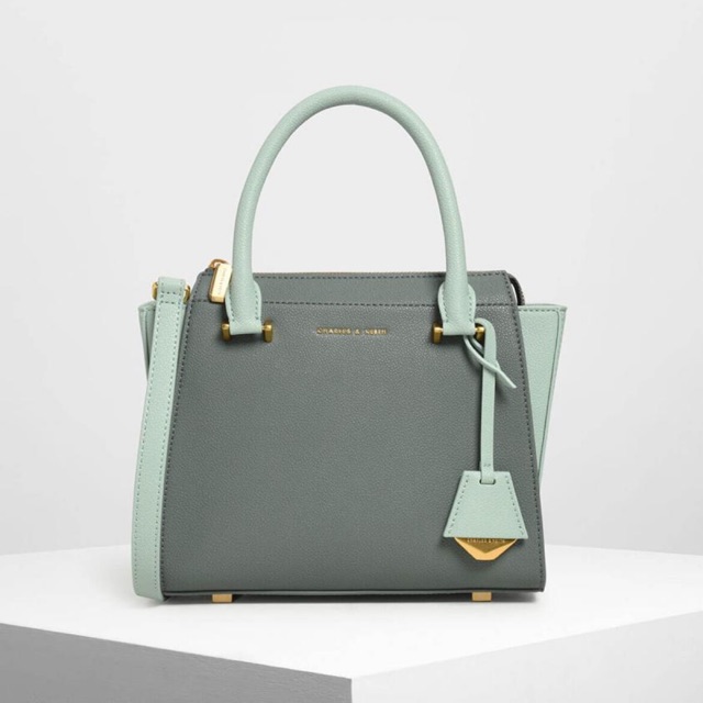 Charles & keith on sale top handle trapeze bag