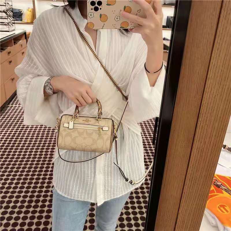 Mini best sale bolsa coach