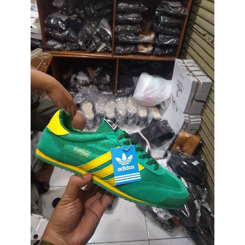 Adidas dragon trainers outlet green and yellow