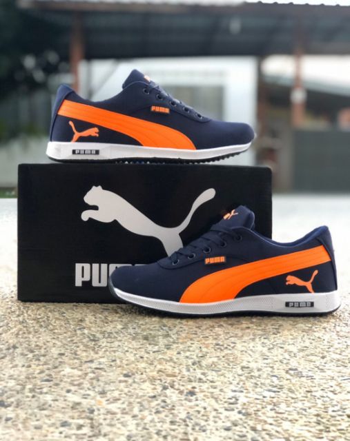 Puma blue best sale and orange sneakers