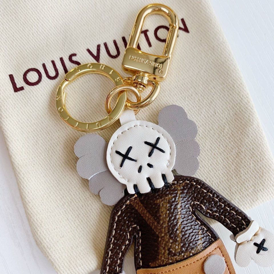 Louis Vuitton Kaws Bag Charm & Key Holder, Women's Fashion, Jewelry &  Organisers, Accessory holder, box & organisers on Carousell