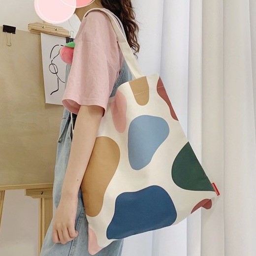 Women's canvas tote bag with online zipper