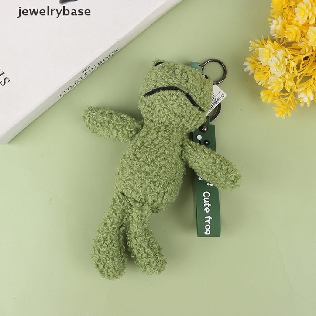 Green deals frog doll