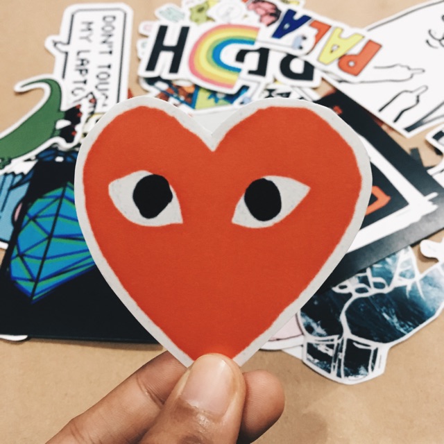 Comme des garcons sticker on sale