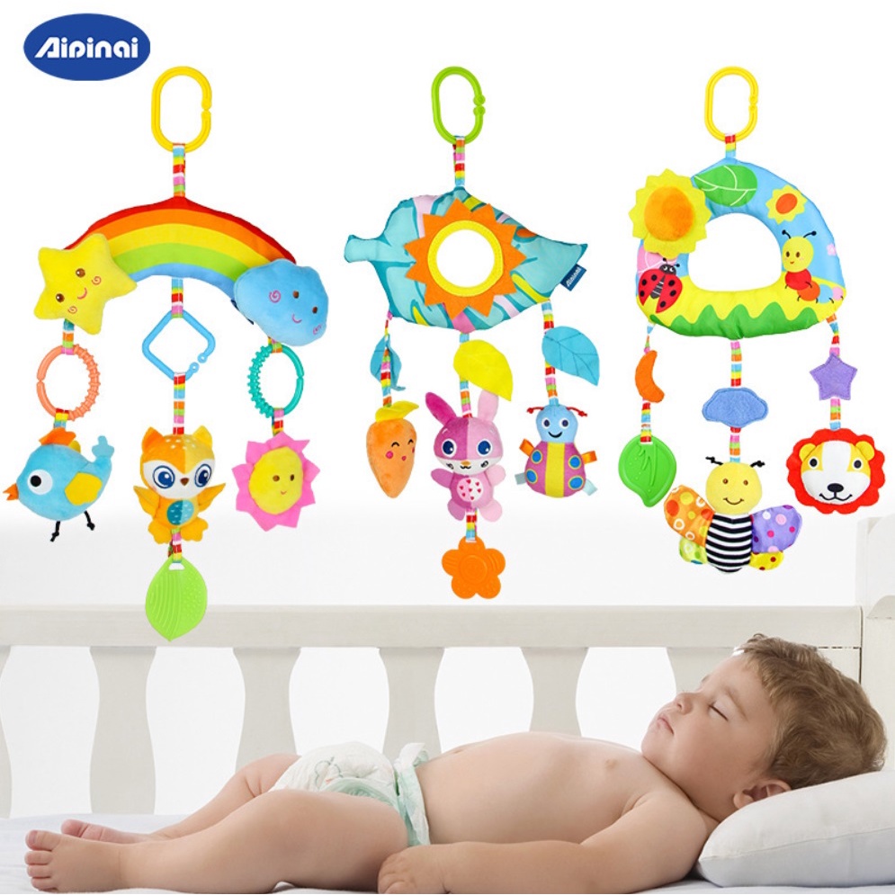 Baby hanging toys on deals the crib