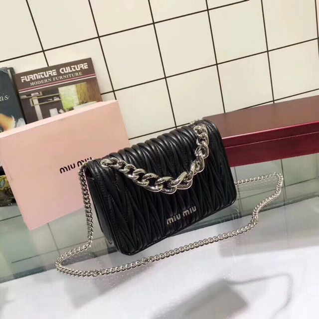 Miu miu sling on sale bag