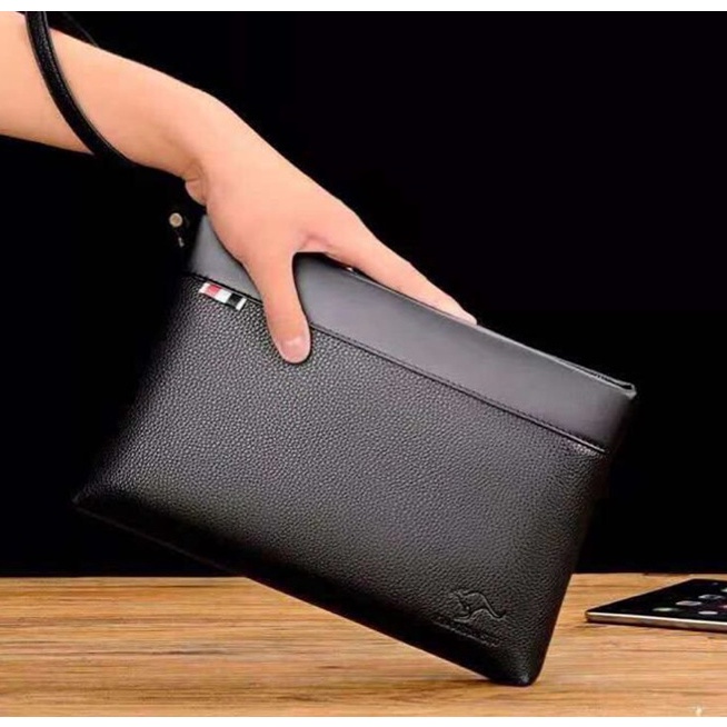 Clutch bag with online hand grip