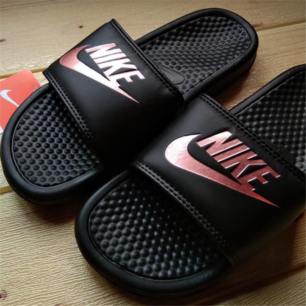 price of original nike slippers