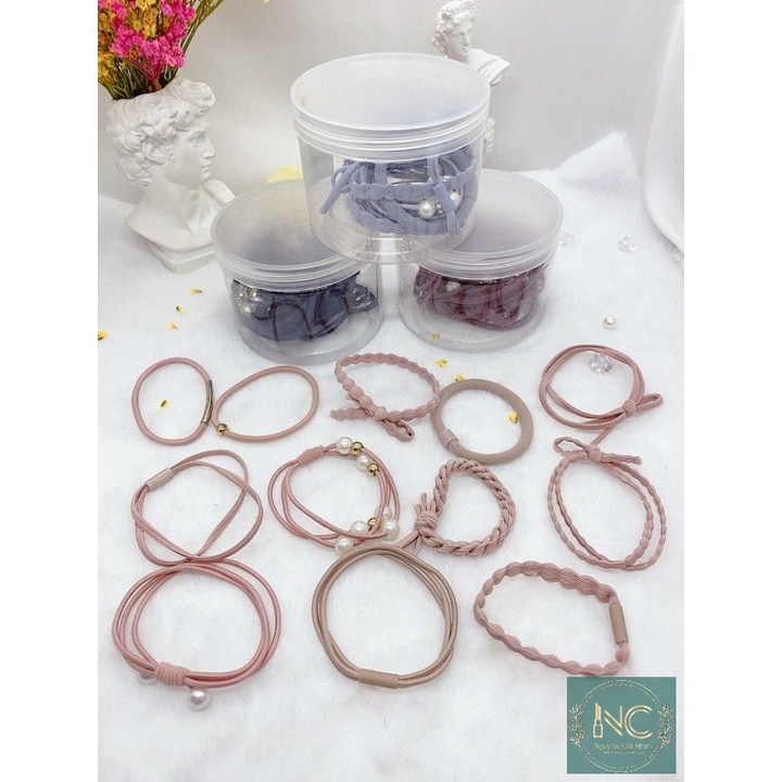 Set of 12 hair ties with 12 cute and highclass designs with box