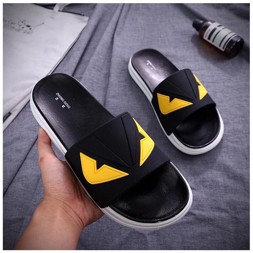 Fendi slides yellow eyes on sale