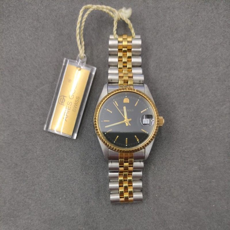 Aries gold swiss sale