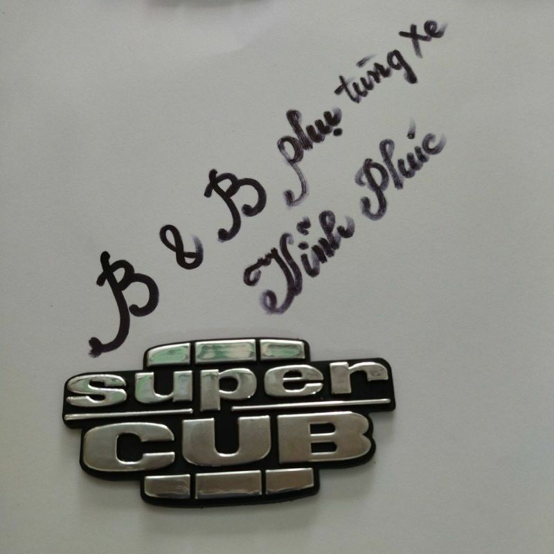 Super Cub Stamp Embossed Gold And Silver Iridescent HighEnd logo