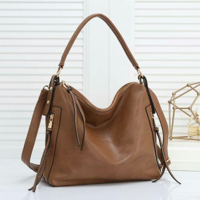 Latest hot sale fossil handbags