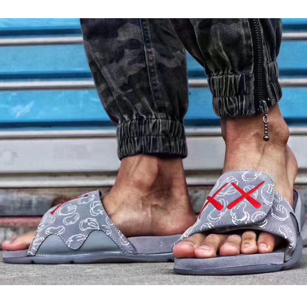 Jordan on sale kaws slides