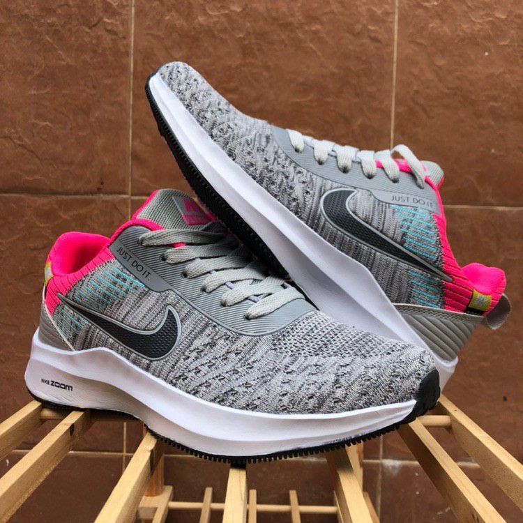 Nike flyknit grey pink hotsell