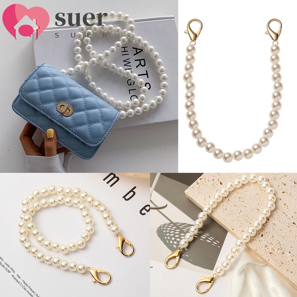 Purse with hevy pearl strap
