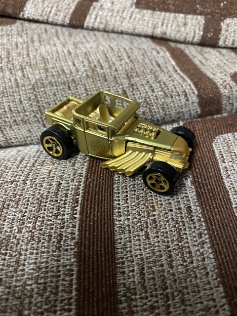 Larry wood gold bone shaker on sale