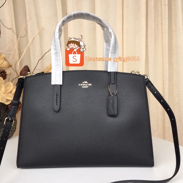 Coach charlie pebble leather carryall deals