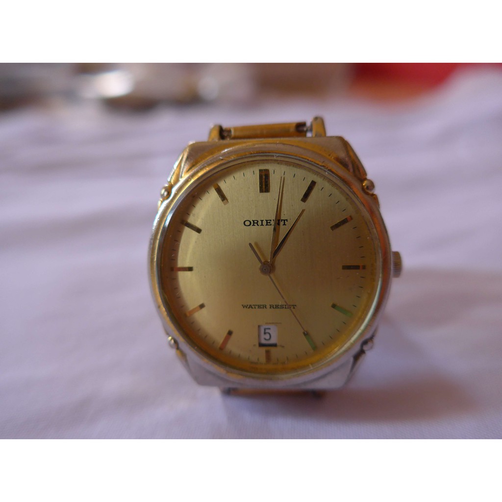 Orient quartz cheap gold watch