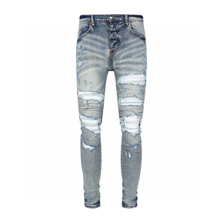 Fashionable new men's light blue jeans with pleated and torn patches ...