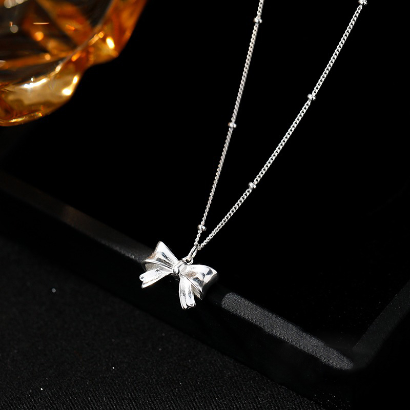 Trendy Design Chain With Stylish Bow Pendent